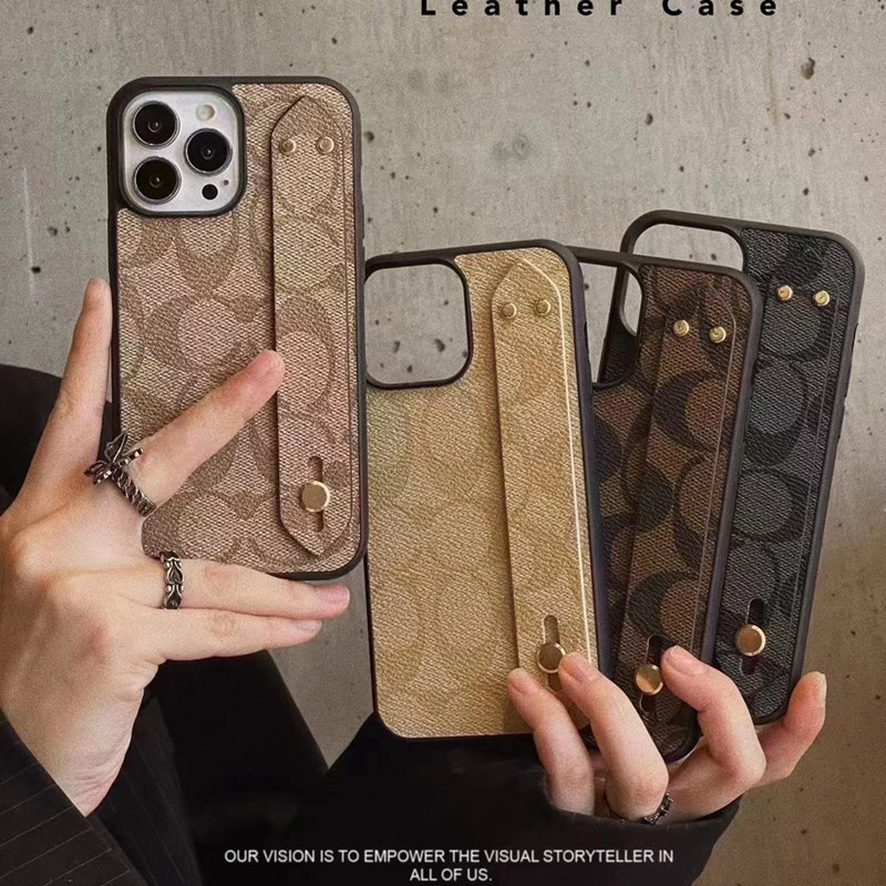 Coach コーチ ブランド iphone 15/14 pro maxケース インスタ風 ハンドバンド付 ジャケット型 アイフォン14